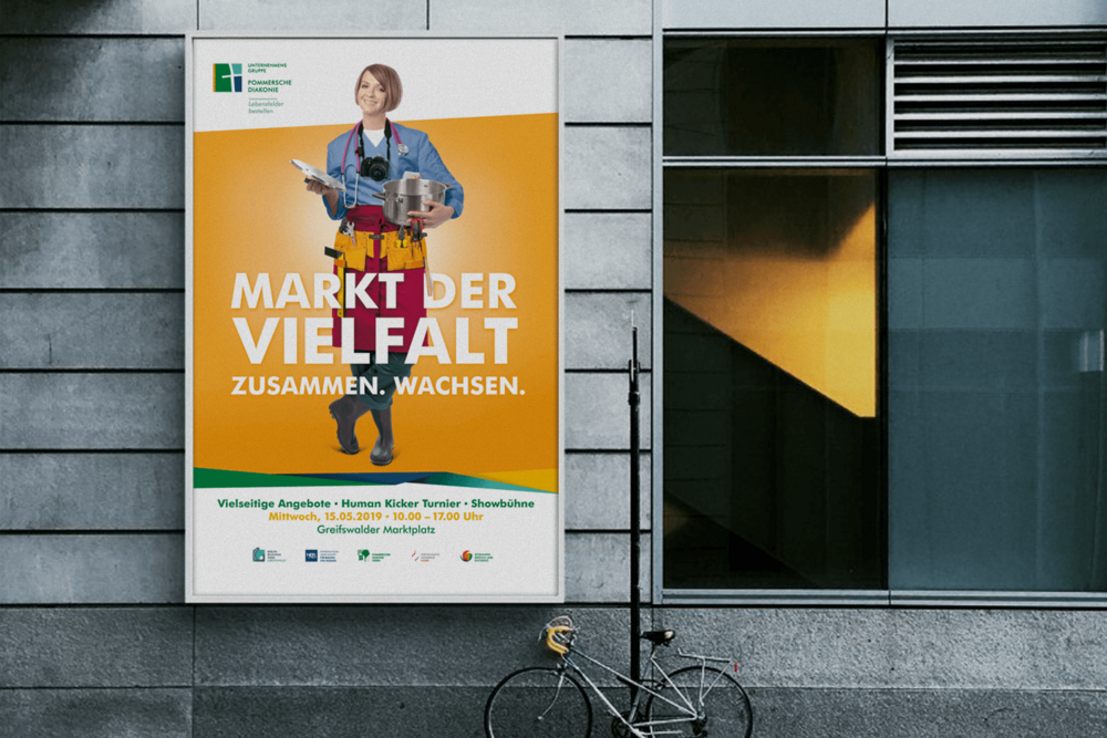 Von uns erstelltes Plakat an einer Hauswand