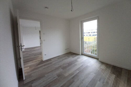 Wohnraum im Betreuten Wohnen in der Bleichstr. Greifswald mit Fenster und Lampenhalterung